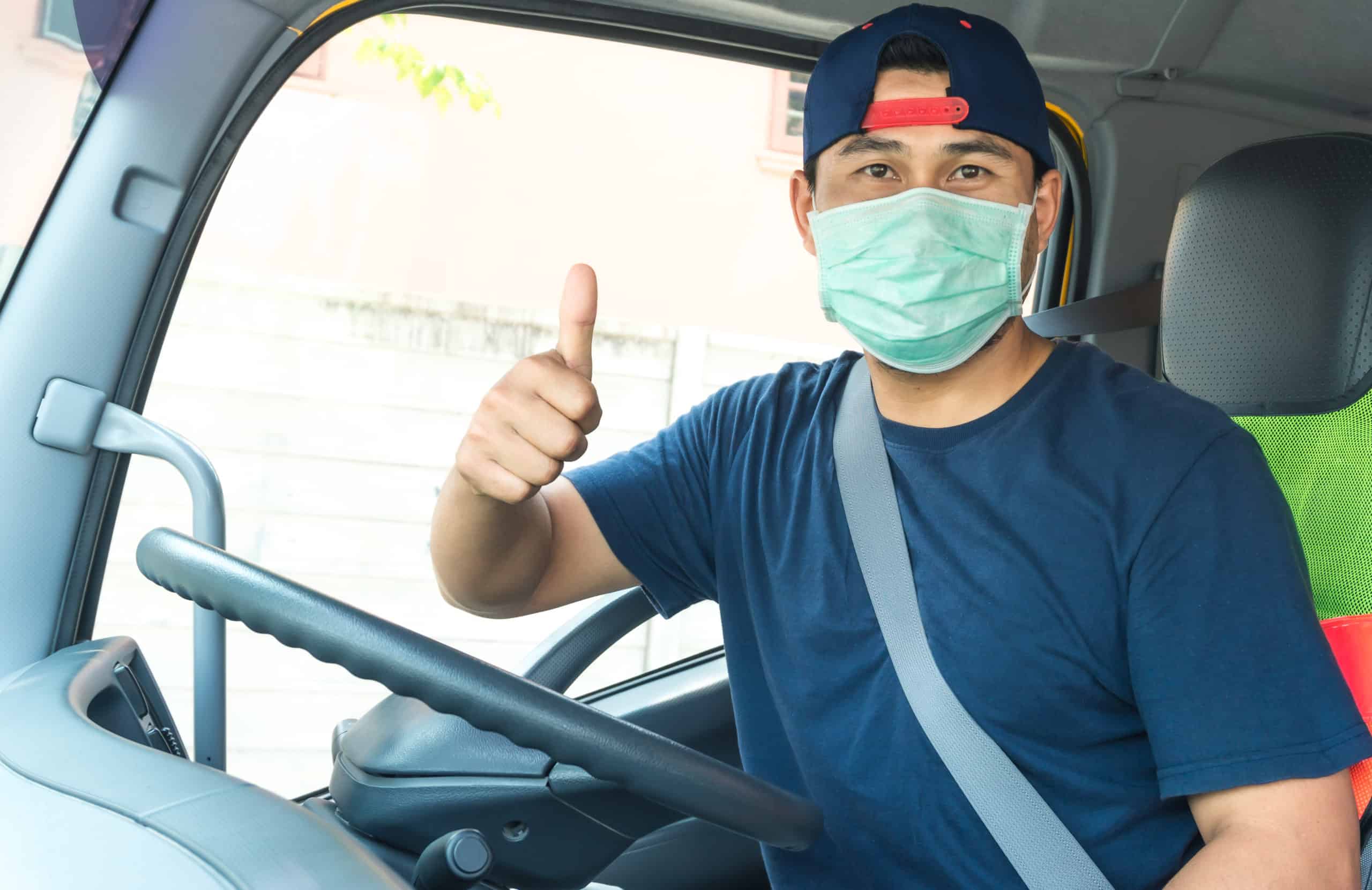 Trucker wearing mask for coronavirus protection